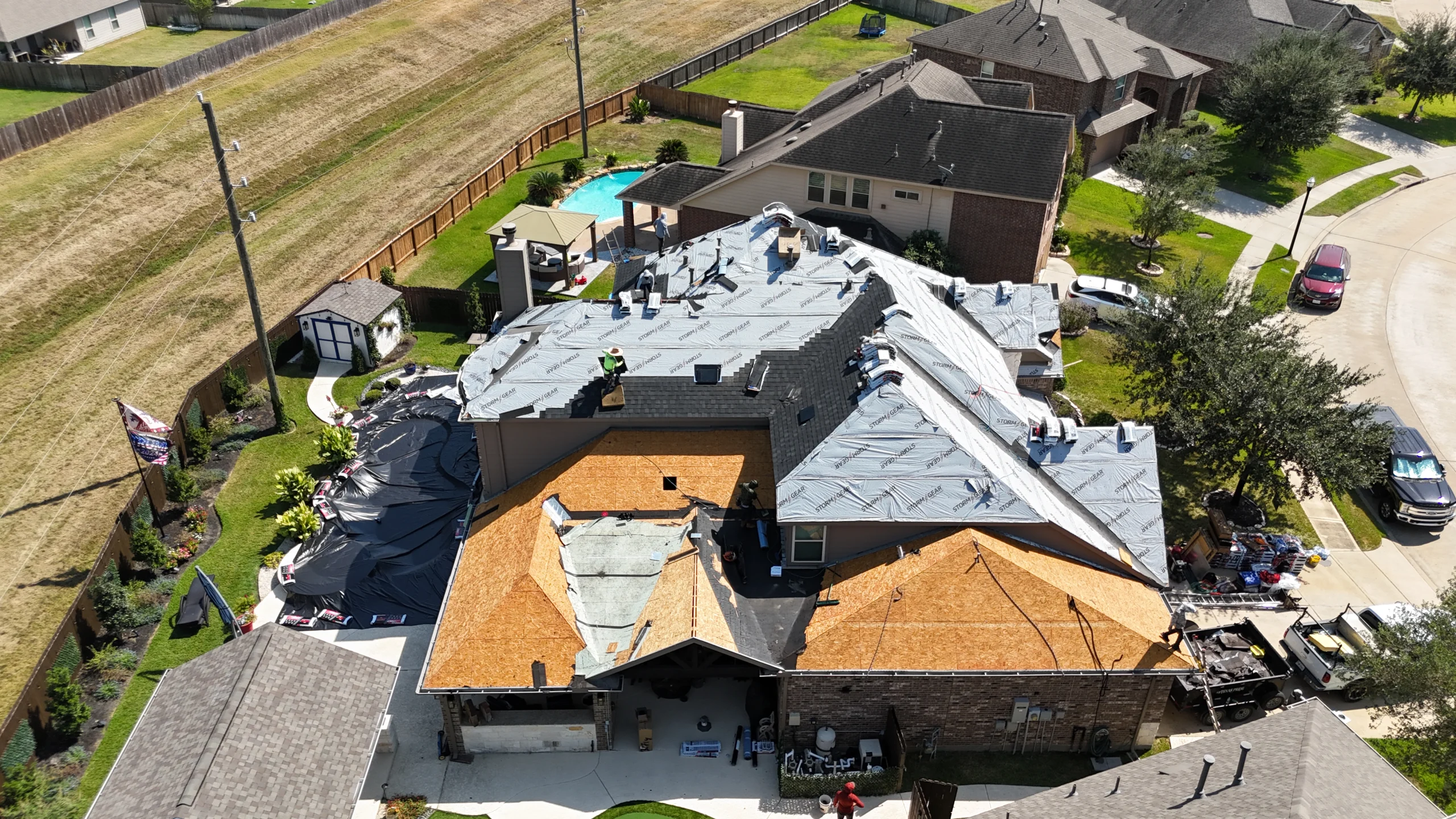Workers repairing roof in texas